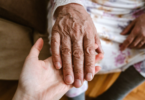 Community health worker assisting person in need